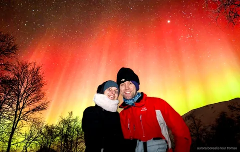 Aurora borealis over an Arctic landscape near Tromso