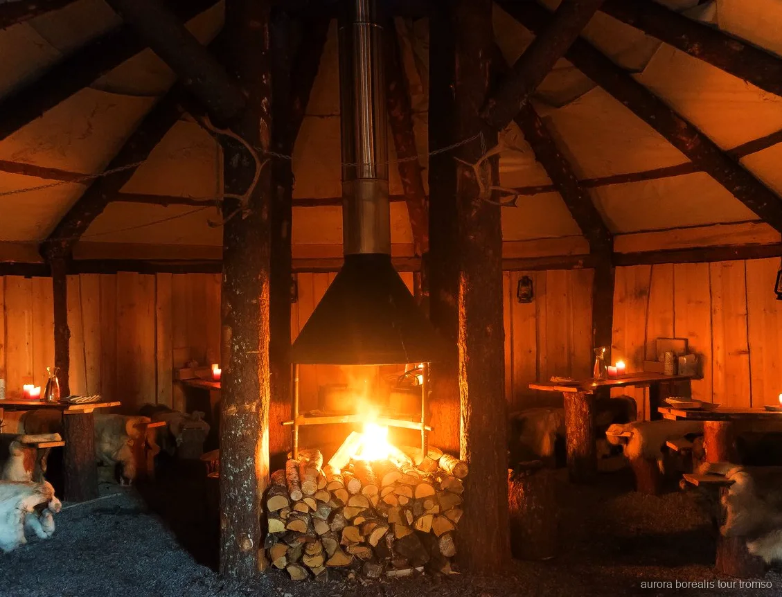 Traditional Sami dinner served inside a lavvu near Tromso